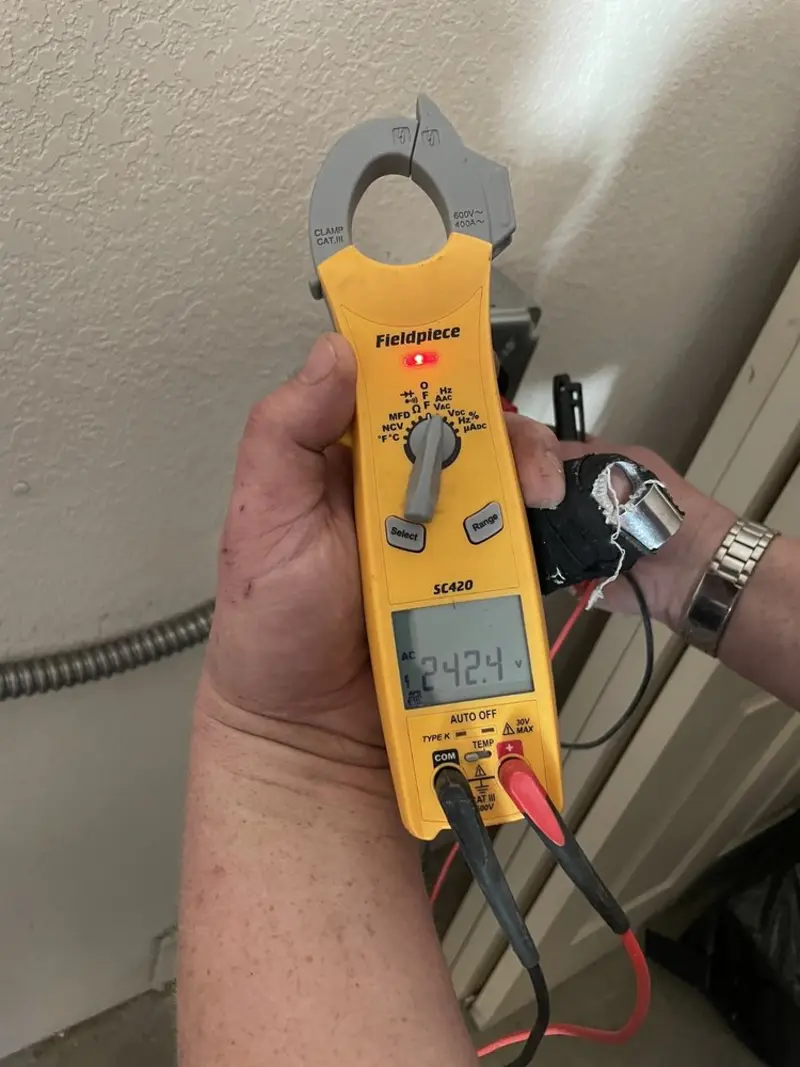 Voltage testing with clamp meter during Generator Installation in Swainsboro